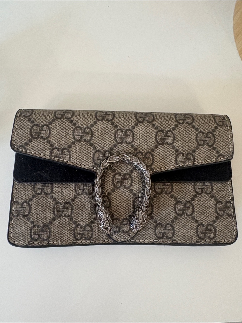 Beige and BlackSupreme Clutch, 6.5”X4” approx. EUC. Fastship.